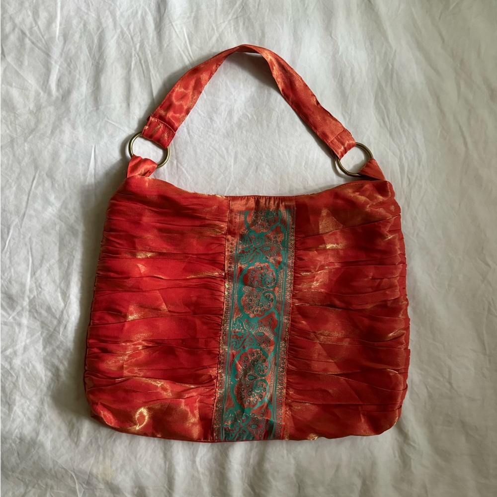 red orange shoulder bag